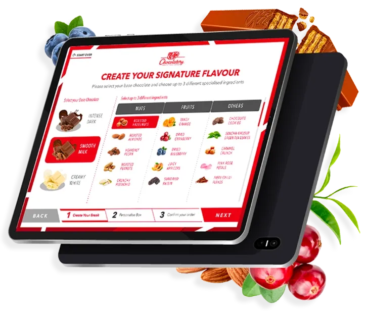 Interactive tablet showcasing the KitKat Chocolatory platform, highlighting Trinergy’s innovative approach to personalized chocolate crafting experiences.