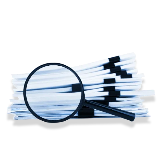 A magnifying glass over a stack of documents symbolizing Trinergy's focus on detailed research and in-depth analysis for business solutions.